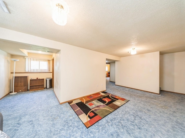 3436 Valley View Dr, West Des Moines, IA 50265 - basement featuring carpet flooring and a textured ceiling