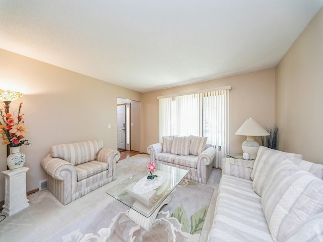 3436 Valley View Dr, West Des Moines, IA 50265 - living room featuring light colored carpet