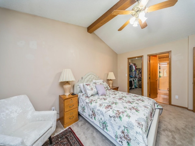 3436 Valley View Dr, West Des Moines, IA 50265 - bedroom featuring light colored carpet, a walk in closet, a closet, ceiling fan, and connected bathroom