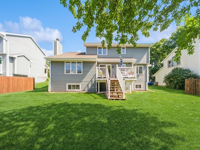 3436 Valley View Dr, West Des Moines, IA 50265 - back of house with stairway, a wooden deck, and a chimney