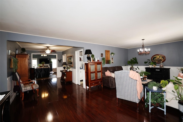 344 S 1st St, Ogden, IA 50212 - living area with wood finished floors, ceiling fan, and a chandelier