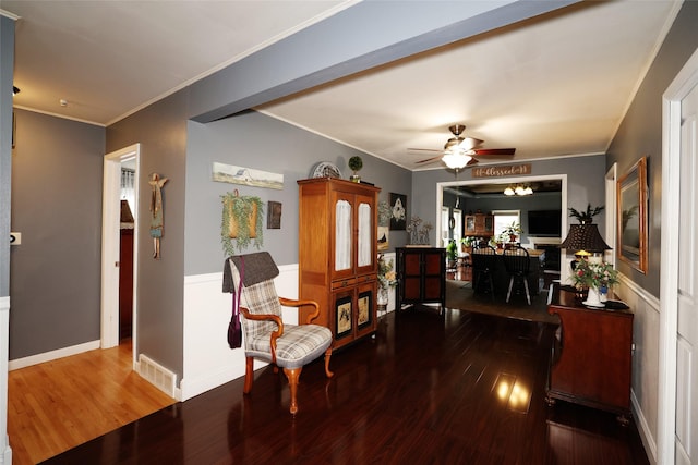 344 S 1st St, Ogden, IA 50212 - dining space featuring hardwood / wood-style floors, a ceiling fan, and crown molding