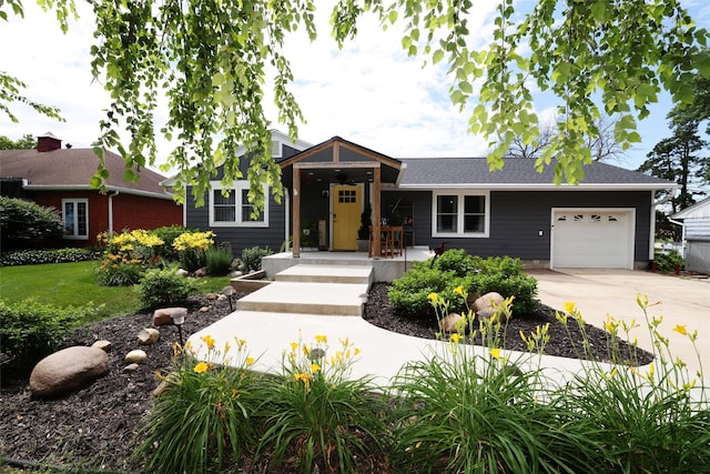 344 S 1st St, Ogden, IA 50212 - view of front of property with driveway and an attached garage
