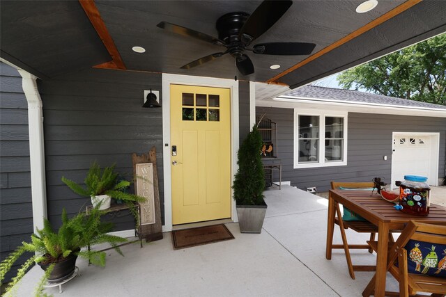 344 S 1st St, Ogden, IA 50212 - entrance to property featuring a ceiling fan, outdoor dining space, and a patio area