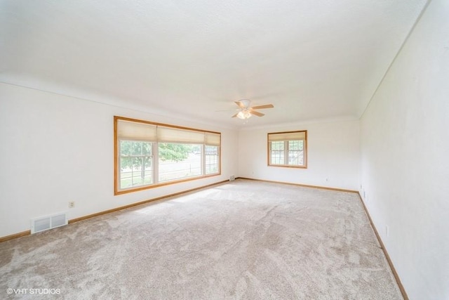 1805 Sycamore St, Granger, IA 50109 - carpeted empty room with a ceiling fan and baseboards