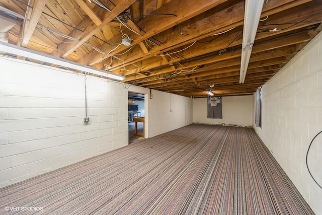 1805 Sycamore St, Granger, IA 50109 - unfinished basement with dark carpet