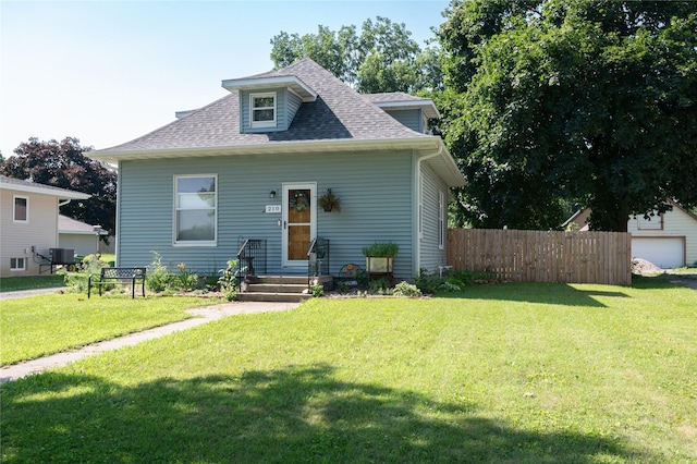 210 3rd St NE, Mitchellville, IA 50169 - bungalow-style home featuring roof with shingles