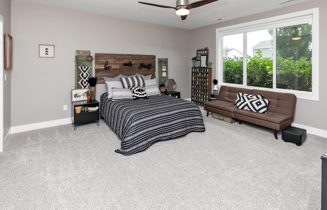 9138 Moonseed Ct, West Des Moines, IA 50266 - carpeted bedroom featuring baseboards and ceiling fan