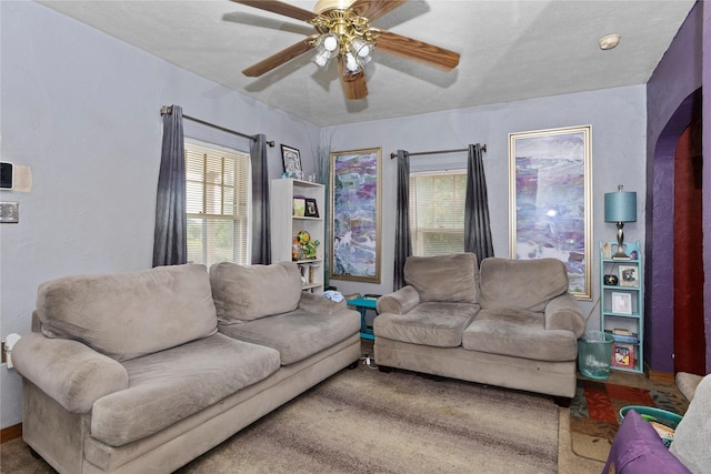 1054 14th St, Des Moines, IA 50314 - living room with a ceiling fan