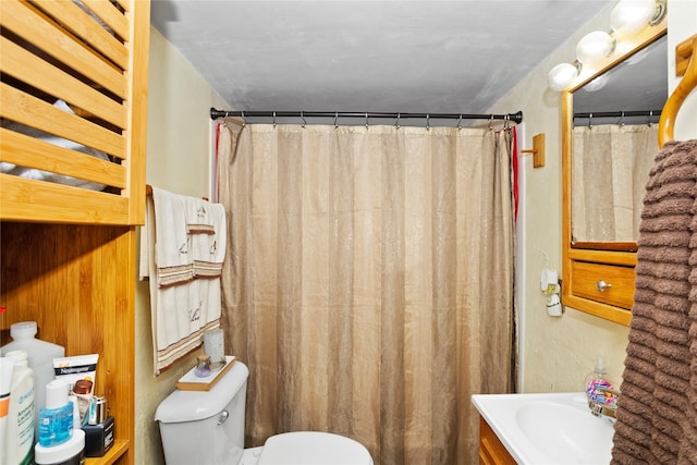 1054 14th St, Des Moines, IA 50314 - full bathroom with vanity and a shower with shower curtain