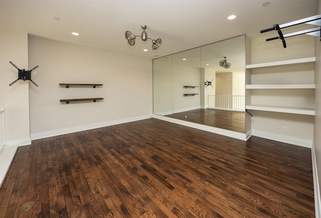 4701 150th St, Urbandale, IA 50323 - unfurnished living room with wood finished floors and recessed lighting