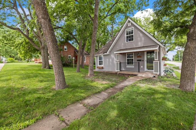402 S 11th St, Adel, IA 50003 - view of front of home featuring a porch and a front yard