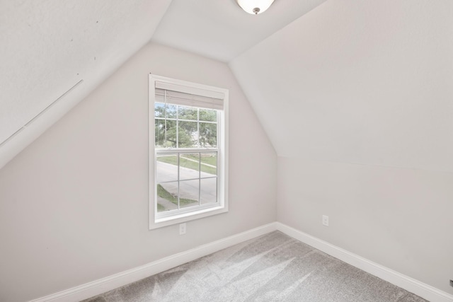 402 S 11th St, Adel, IA 50003 - additional living space featuring vaulted ceiling and carpet