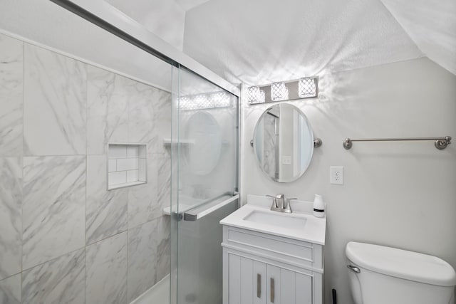 402 S 11th St, Adel, IA 50003 - bathroom with vanity, a stall shower, and lofted ceiling