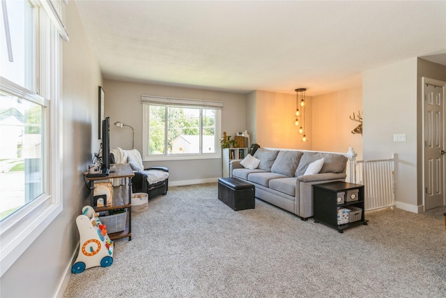 311 W 15th St N, Newton, IA 50208 - carpeted living area with baseboards