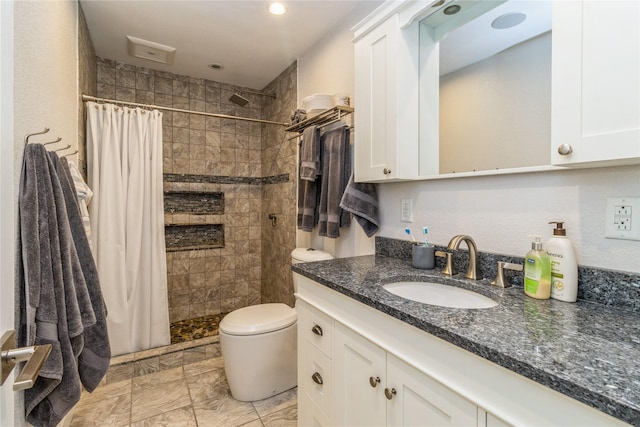 311 W 15th St N, Newton, IA 50208 - bathroom with vanity, a tile shower, and recessed lighting