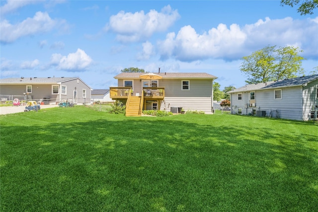 311 W 15th St N, Newton, IA 50208 - rear view of property with stairway, a deck, and a fenced backyard