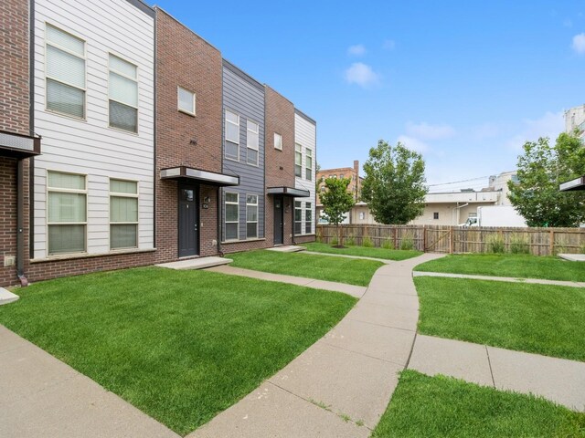 316 SW 6th St Unit 106, Des Moines, IA 50309 - view of front of property with brick siding