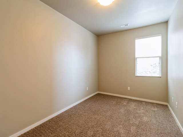 316 SW 6th St Unit 106, Des Moines, IA 50309 - unfurnished room with carpet flooring