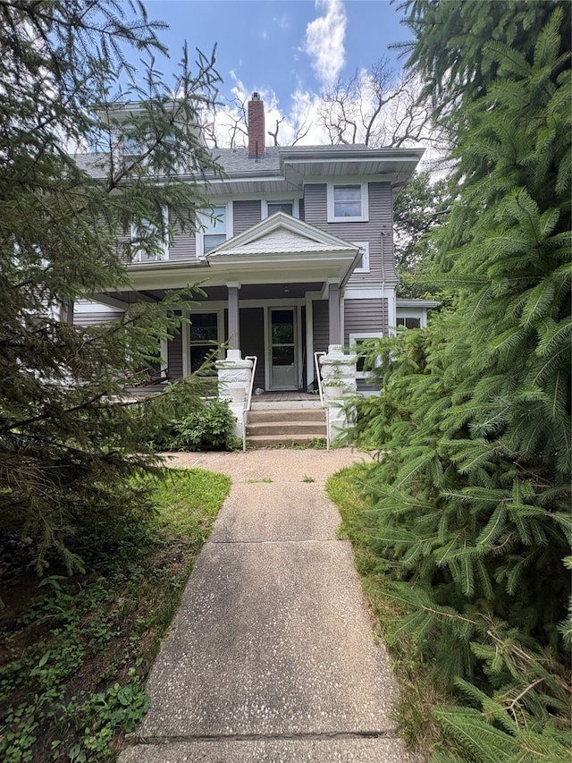3101 Cottage Grove Ave, Des Moines, IA 50311 - american foursquare style home with a chimney and covered porch