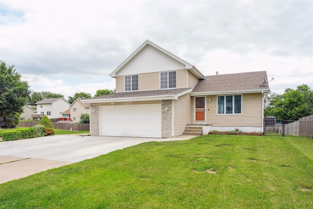 2907 E 43rd St, Des Moines, IA 50317 - split level home featuring an attached garage, brick siding, driveway, and roof with shingles