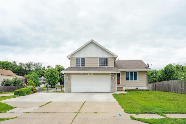 2907 E 43rd St, Des Moines, IA 50317 - view of front of house with driveway, an attached garage, and a shingled roof