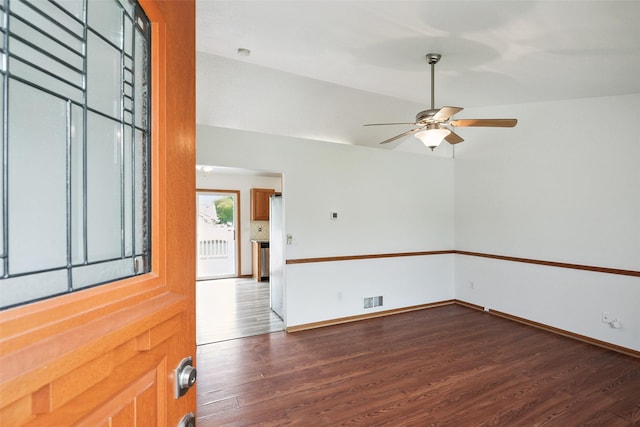 2907 E 43rd St, Des Moines, IA 50317 - spare room featuring dark wood-style floors and ceiling fan