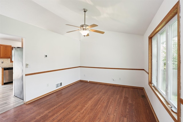 2907 E 43rd St, Des Moines, IA 50317 - unfurnished room with light wood-type flooring, a ceiling fan, and lofted ceiling