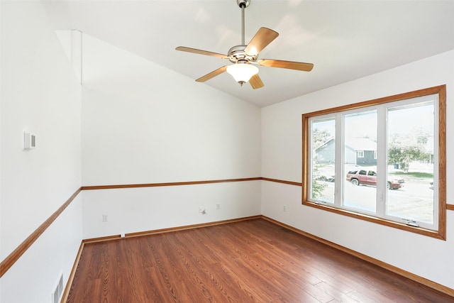 2907 E 43rd St, Des Moines, IA 50317 - empty room with wood finished floors and a ceiling fan