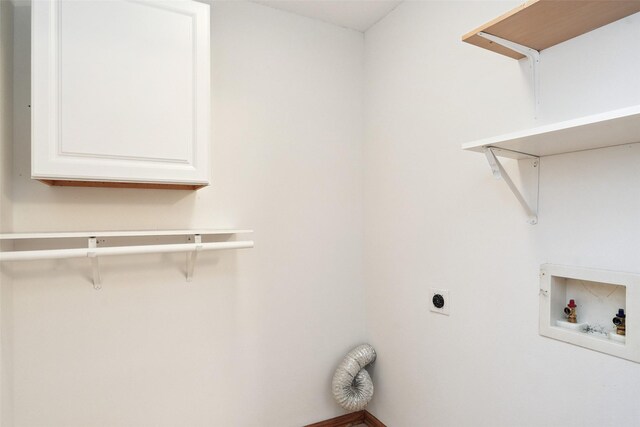 2907 E 43rd St, Des Moines, IA 50317 - laundry area with hookup for an electric dryer, cabinet space, and washer hookup