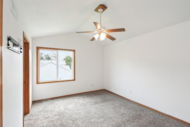 2907 E 43rd St, Des Moines, IA 50317 - carpeted spare room with ceiling fan and lofted ceiling