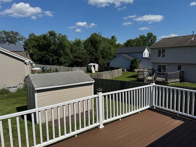 2907 E 43rd St, Des Moines, IA 50317 - wooden deck with a storage shed