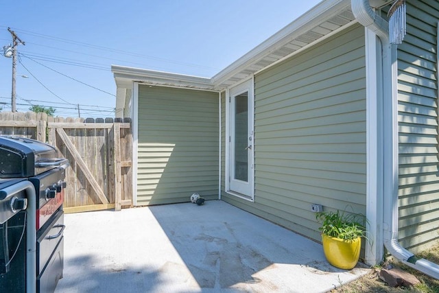 1421 N 4th Ave E, Newton, IA 50208 - view of patio / terrace featuring a grill