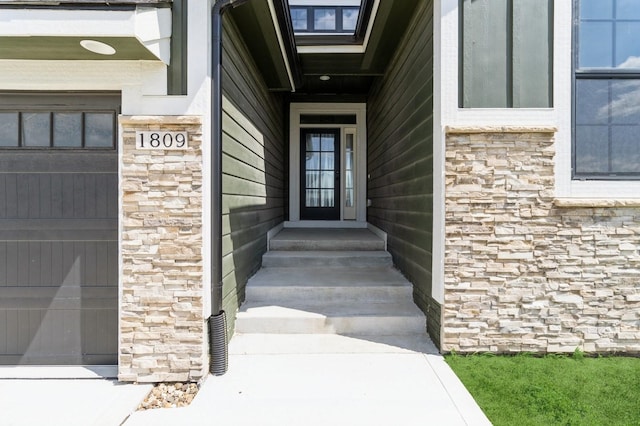 1809 12th St SE, Altoona, IA 50009 - view of exterior entry featuring stone siding
