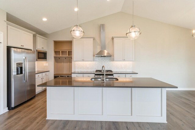1809 12th St SE, Altoona, IA 50009 - kitchen featuring stainless steel fridge with ice dispenser, wall chimney range hood, black microwave, dark countertops, and vaulted ceiling