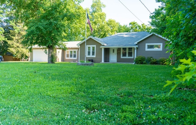 1600 Evergreen Ave, Des Moines, IA 50320 - ranch-style home with a front lawn and an attached garage
