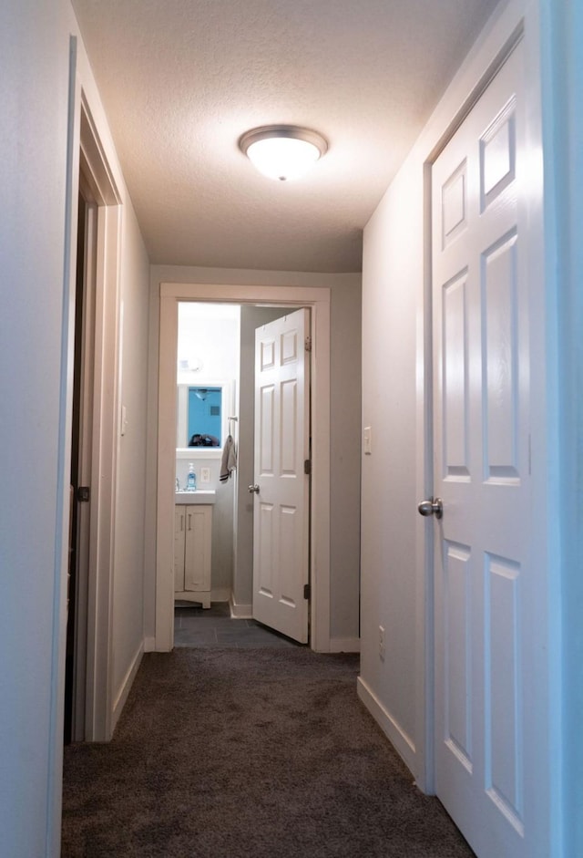 1600 Evergreen Ave, Des Moines, IA 50320 - corridor featuring carpet and baseboards