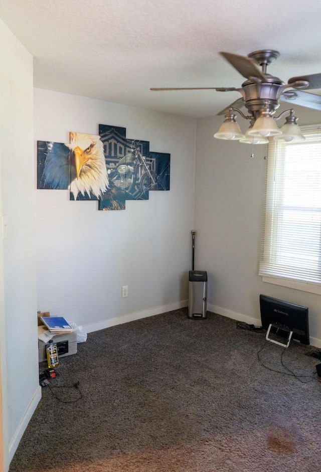 1600 Evergreen Ave, Des Moines, IA 50320 - spare room featuring ceiling fan and carpet flooring
