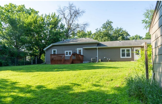 1600 Evergreen Ave, Des Moines, IA 50320 - rear view of property with a wooden deck