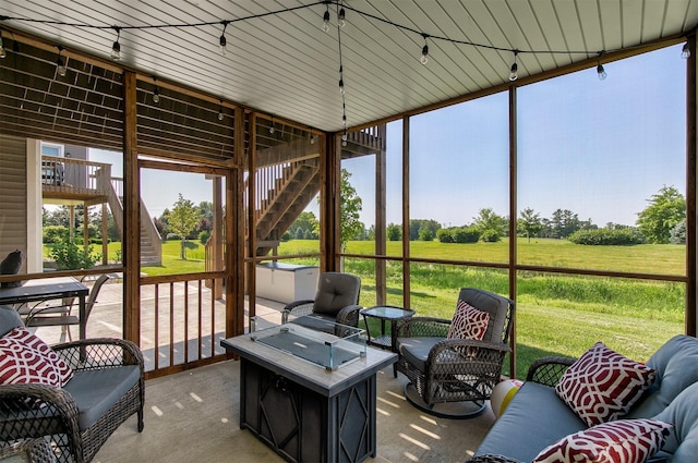 8932 Mockingbird Dr, West Des Moines, IA 50266 - sunroom / solarium featuring outdoor lounge area