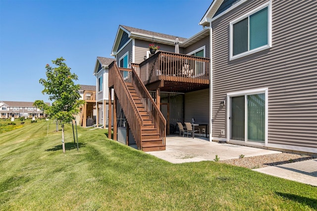8932 Mockingbird Dr, West Des Moines, IA 50266 - back of property featuring a deck, stairs, a patio, and a yard