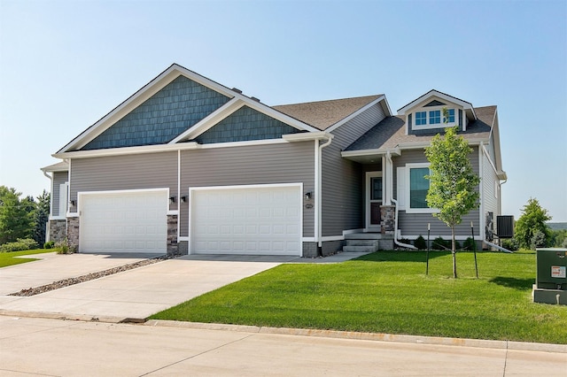 8932 Mockingbird Dr, West Des Moines, IA 50266 - craftsman-style house featuring concrete driveway, a front yard, and an attached garage