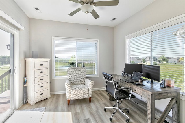 8932 Mockingbird Dr, West Des Moines, IA 50266 - home office featuring light wood-type flooring and ceiling fan