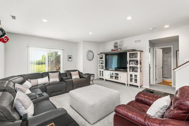 8932 Mockingbird Dr, West Des Moines, IA 50266 - carpeted living room with recessed lighting and baseboards