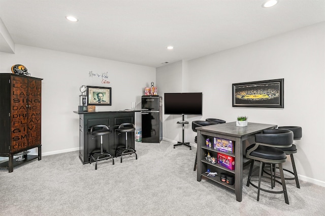 8932 Mockingbird Dr, West Des Moines, IA 50266 - recreation room with light carpet, recessed lighting, and an office area