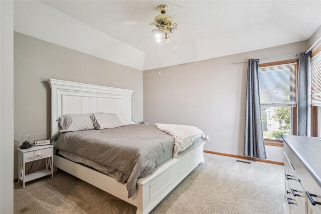 1123 SE Mallard Creek Dr, Ankeny, IA 50021 - carpeted bedroom with baseboards and ceiling fan