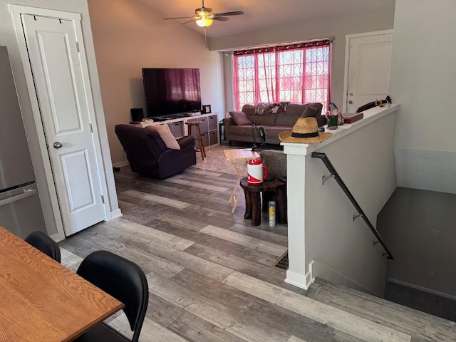 2625 Easton Blvd, Des Moines, IA 50317 - living room with ceiling fan, wood finished floors, and vaulted ceiling