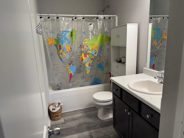 2625 Easton Blvd, Des Moines, IA 50317 - full bathroom featuring vanity, shower / tub combo with curtain, and wood finished floors