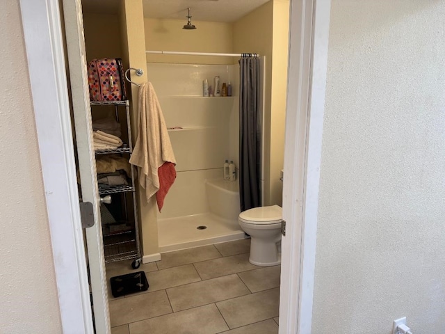 2625 Easton Blvd, Des Moines, IA 50317 - full bathroom with tile patterned flooring and a stall shower