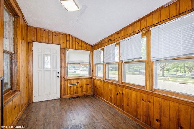 925 Laurel St, Des Moines, IA 50314 - unfurnished sunroom featuring lofted ceiling, wood finished floors, and wood walls